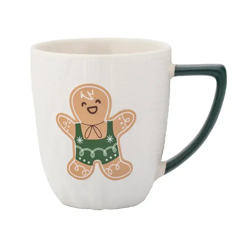 Kolorowa ceramiczna kubek z bajkowym piernikowym misia, idealny na prezent dla dzieci, ręcznie malowany, wzór z juty i świątecznymi motywami, wysokiej jakości, Domowy Zakątek.