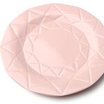 Kolorowa ceramiczna miseczka w różowym odcieniu z geometrycznym wzorem na powierzchni, idealna do serwowania deserów i przekąsek w domu.