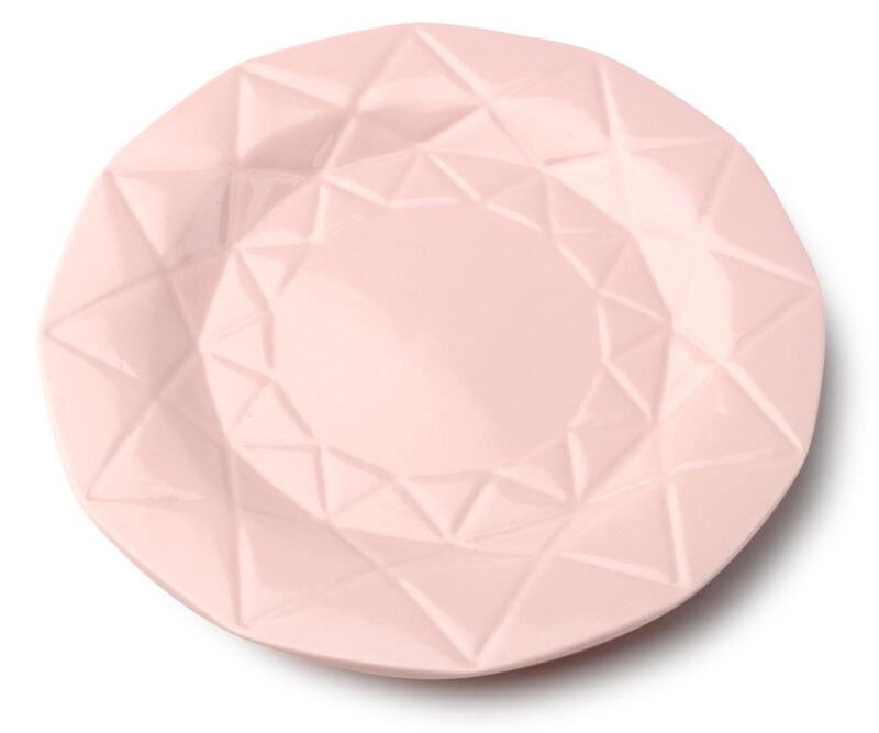 Kolorowa ceramiczna miseczka w różowym odcieniu z geometrycznym wzorem na powierzchni, idealna do serwowania deserów i przekąsek w domu.