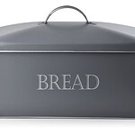 Elegancka metalowa pudełko na pieczywo z napisem "BREAD", idealne do kuchni i przechowywania świeżego chleba, nowoczesny design, praktyczne rozwiązanie, domowy zakątek.