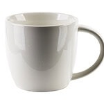 Gładka biała ceramiczna filiżanka na kawę lub herbatę w domowym zaciszu, idealna do codziennego użytku w domu i biurze.