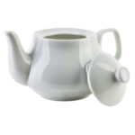 Biała ceramiczna czajnik na herbatę z czajnikiem i pokrywką, idealny do domowego użytku, wysokiej jakości, elegancki design, domowy zakątek, relaks przy filiżance herbaty.