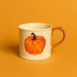 Ceramiczny kubek z ozdobą dyni na Halloween lub秋季 tematy, idealny do kawy lub herbaty, dekoracyjny element do domu typu Domowy Zakątek.